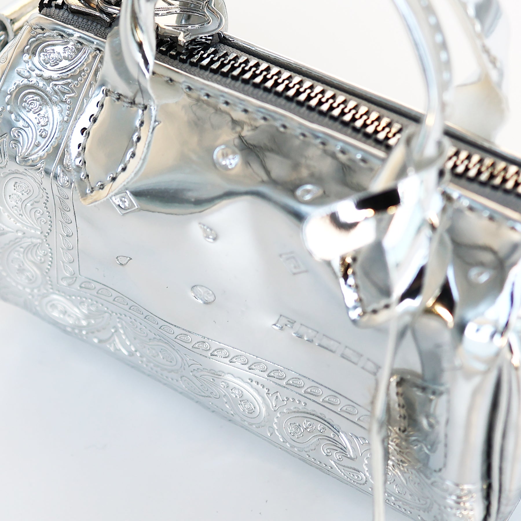 PLATINUM BANDOULIERE - MINI DUFFLE BAG